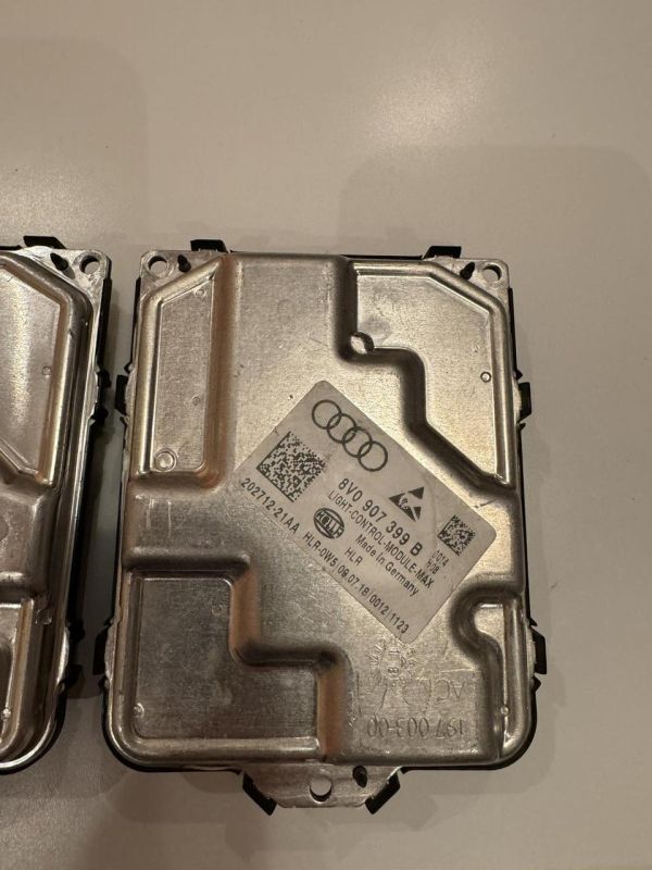 Блок керування фарами Hella 8V0907399B оригінал vw tiguan  Golf 7